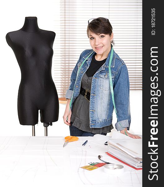 Young adult fashion designer at work