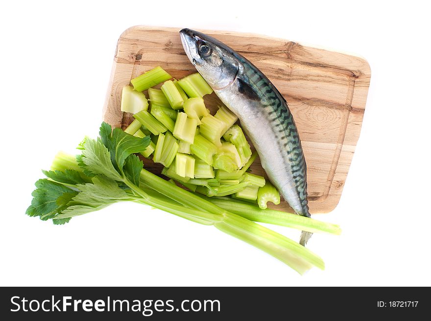 Mackerel and celery isolated on a white background.