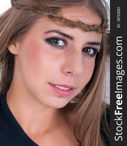 Portrait of a teenage girl smiling isolated on white