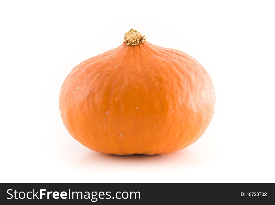 A fresh orange pumpkin on white background