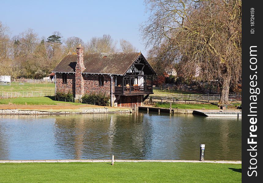 Traditional Boathouse on the River Thames in England