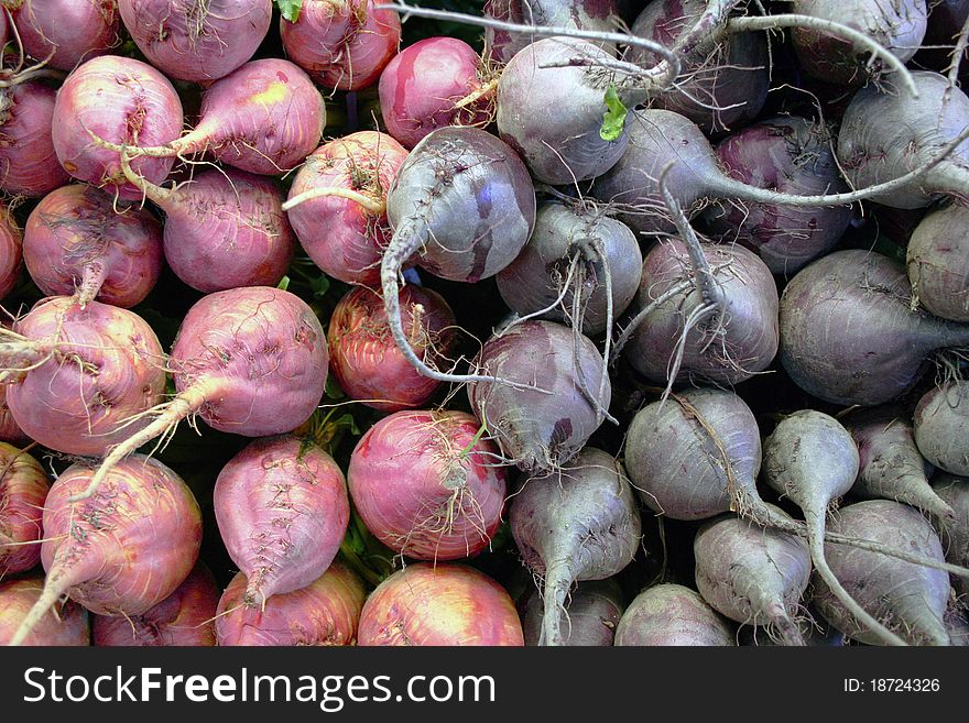 Red and purple beets roots up at farmers market. Red and purple beets roots up at farmers market