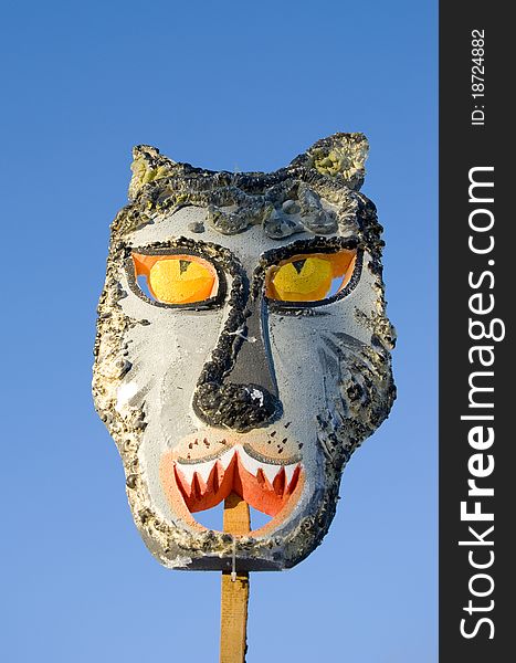Mardi Gras wolf mask on sky background