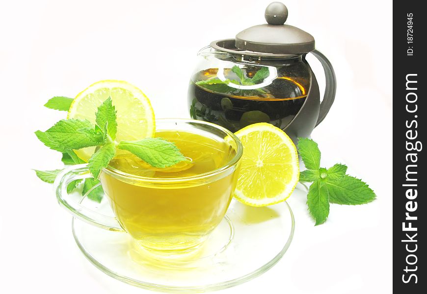 Fruit yellow tea with lemon and fresh mint. Fruit yellow tea with lemon and fresh mint