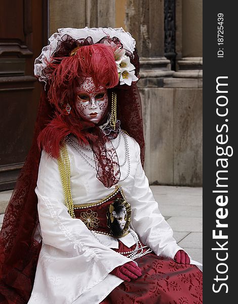 Portrait of Girl wearing Venetian Mask