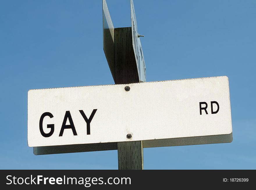Image of road sign with the words Gay Road. Image of road sign with the words Gay Road