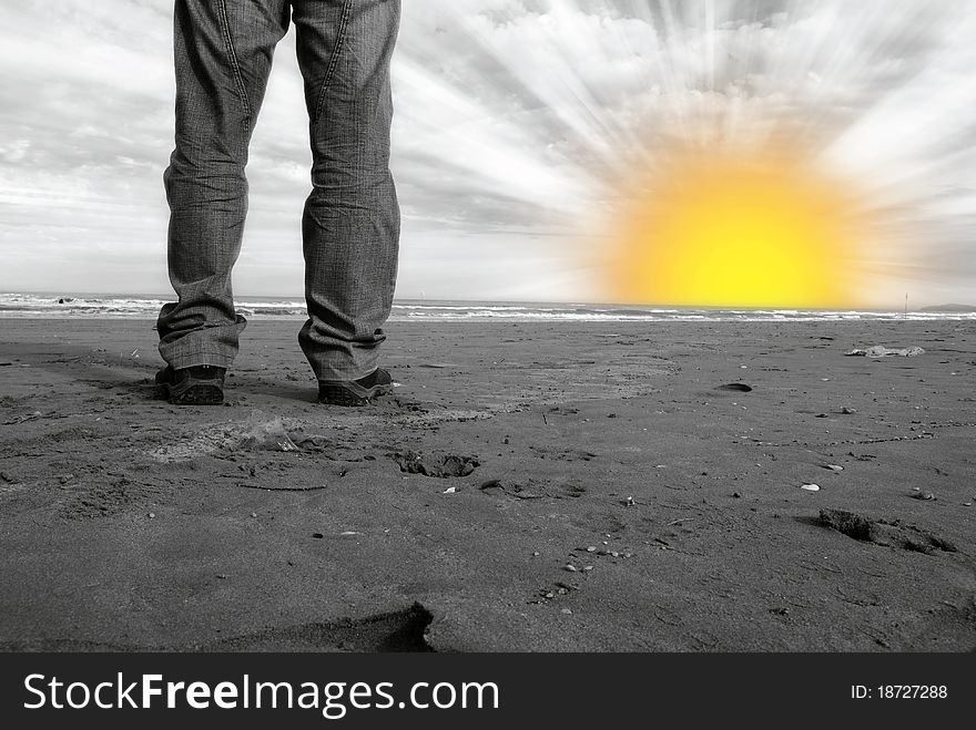 Man watching the sunrise on the sea. Man watching the sunrise on the sea