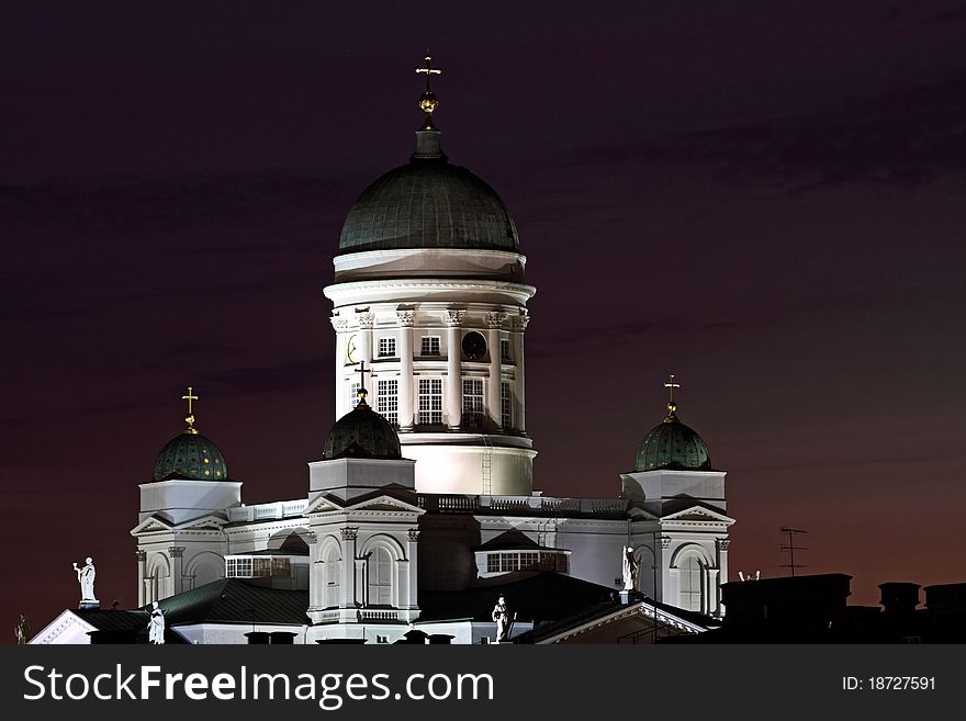 White Lutheran Cathedral of Helsinki illuminated against the darkening late summer sky. White Lutheran Cathedral of Helsinki illuminated against the darkening late summer sky.