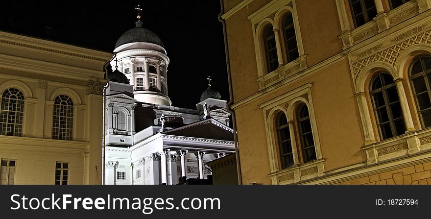 White Lutheran Cathedral of Helsinki illuminated against the darkening late summer sky. White Lutheran Cathedral of Helsinki illuminated against the darkening late summer sky.