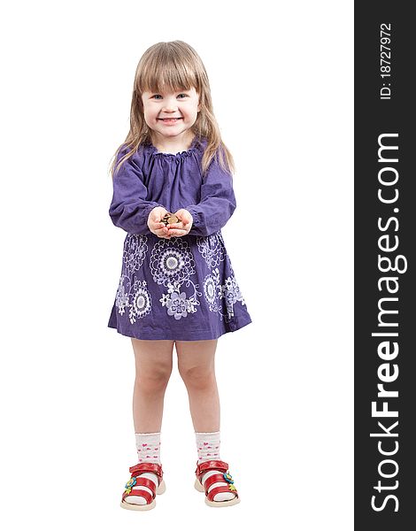 Young girl in purple dress with a lot of coins. Young girl in purple dress with a lot of coins