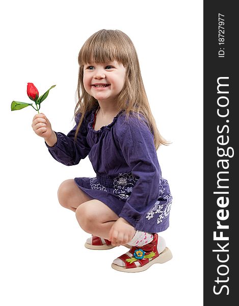 Young girl in purple dress sit with red rose isolated on white background. Young girl in purple dress sit with red rose isolated on white background
