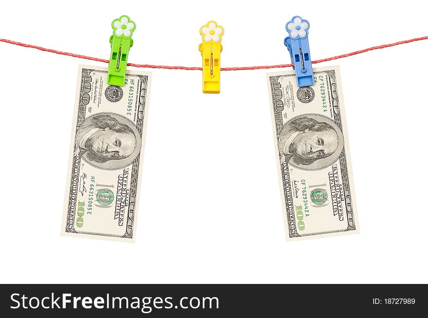 One hundred dollars bill hanging on a clothesline isolated on white background. One hundred dollars bill hanging on a clothesline isolated on white background