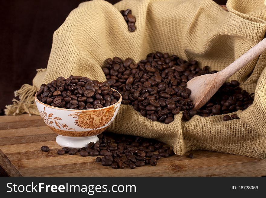 Beans of coffee on a bowl