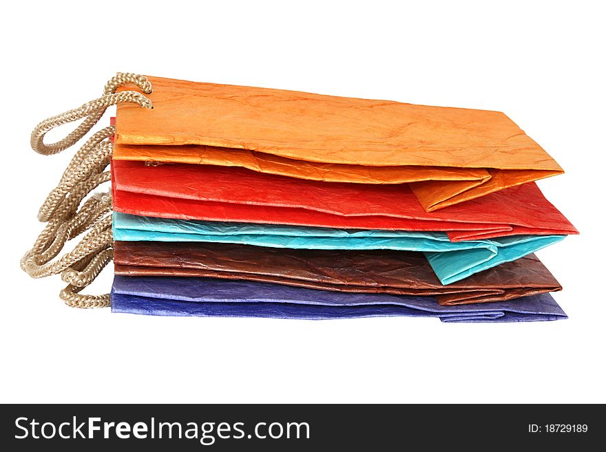 Five color paper bags isolated on the white background