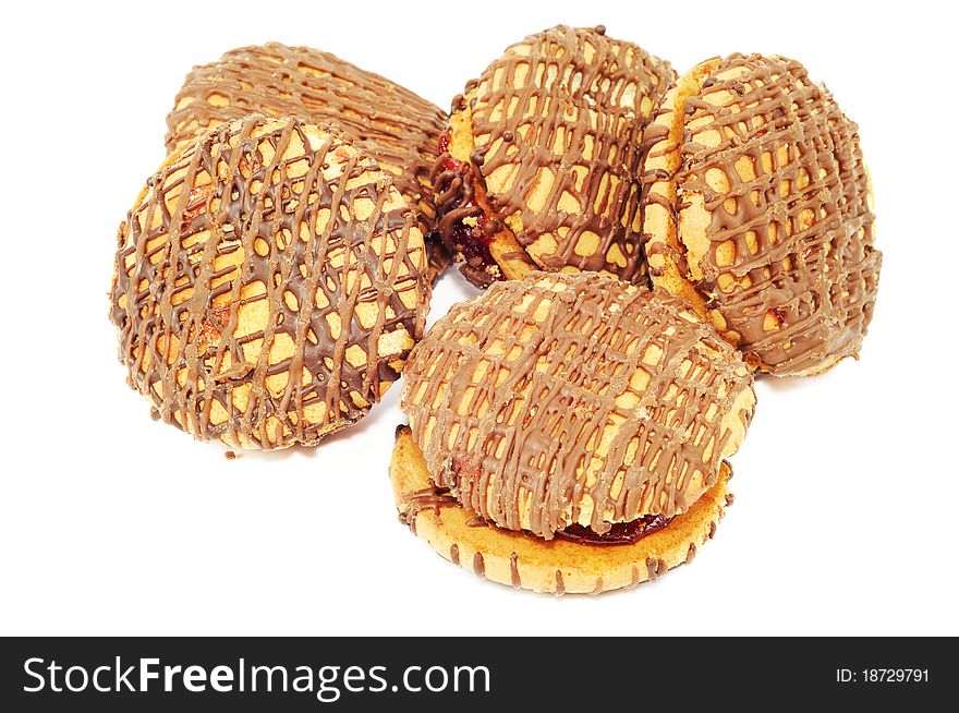 Cookies with milk chocolate , on a white background. Cookies with milk chocolate , on a white background