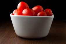 A Bowl Of Cherry Tomatoes On A Wood Table Stock Photography A Bowl Of Cherry Tomatoes On A Wood Table Stock Photography