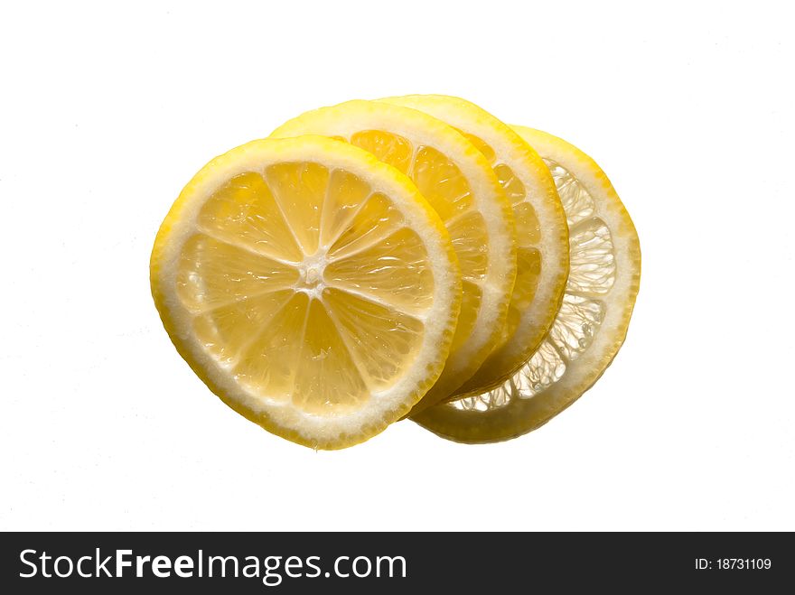 Lemon slices stacked on an isolated background