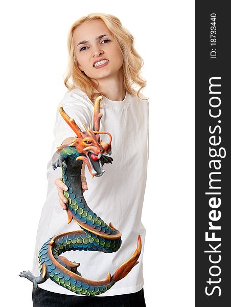 Beautiful girl with a wooden dragon