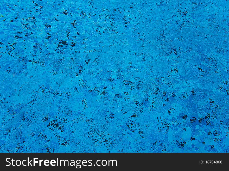 Blue clear water in the pool