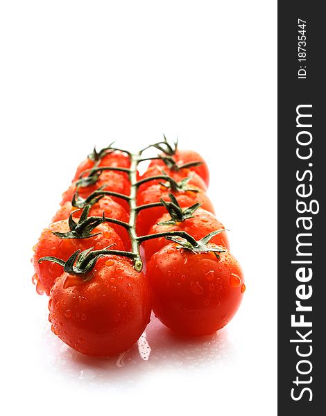 Image of fresh red tomatoes in white.