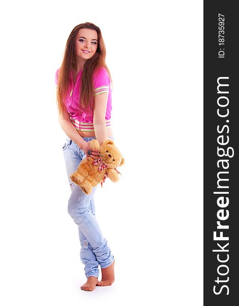 Beautiful longhair girl is holding the teddy bear. Beautiful longhair girl is holding the teddy bear