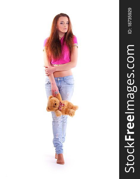 Beautiful longhair girl is holding the teddy bear. Beautiful longhair girl is holding the teddy bear