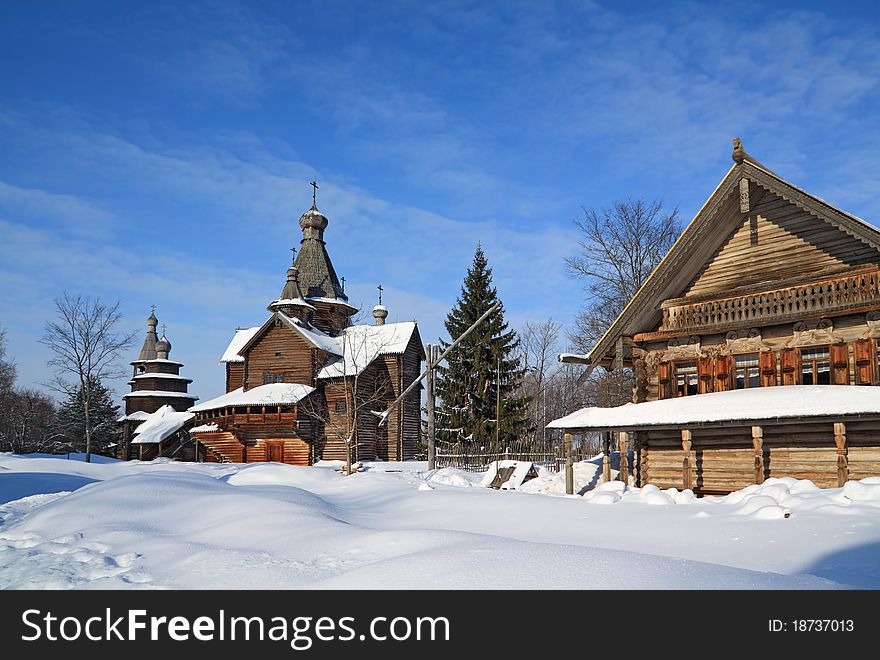 Wooden chapel in winter village