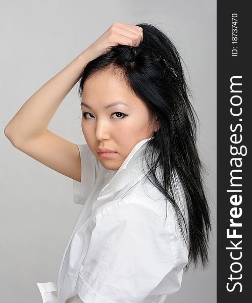 Asian girl closeup portrait on white