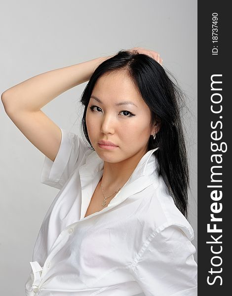 Asian girl closeup portrait on white
