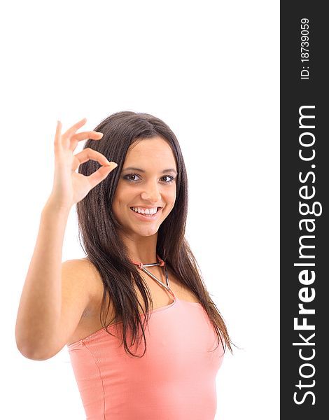 Portrait of a cute female showing an OK sign isolated over white background