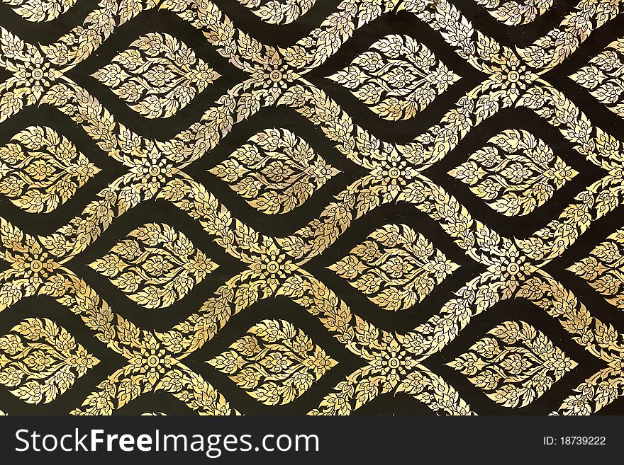 Thai Traditional golden ornament Painting Pattern on Temple door. Thai Traditional golden ornament Painting Pattern on Temple door