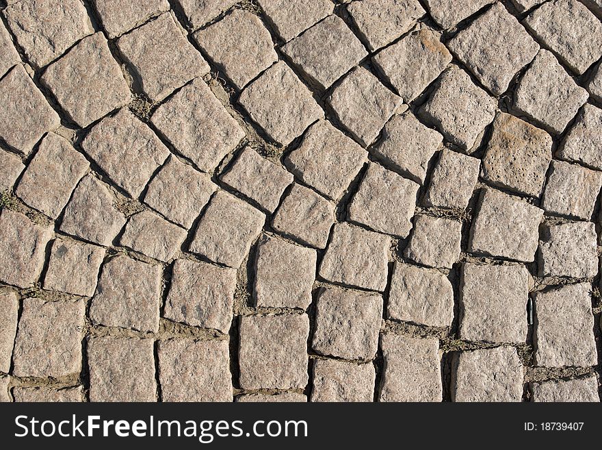 A portion of the street, covered with setts. Shot from above. A portion of the street, covered with setts. Shot from above.