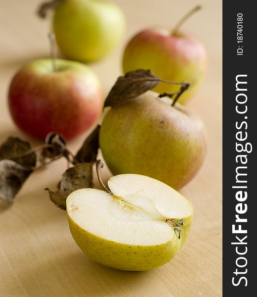 Fresh harvested apples on wooden board. Fresh harvested apples on wooden board