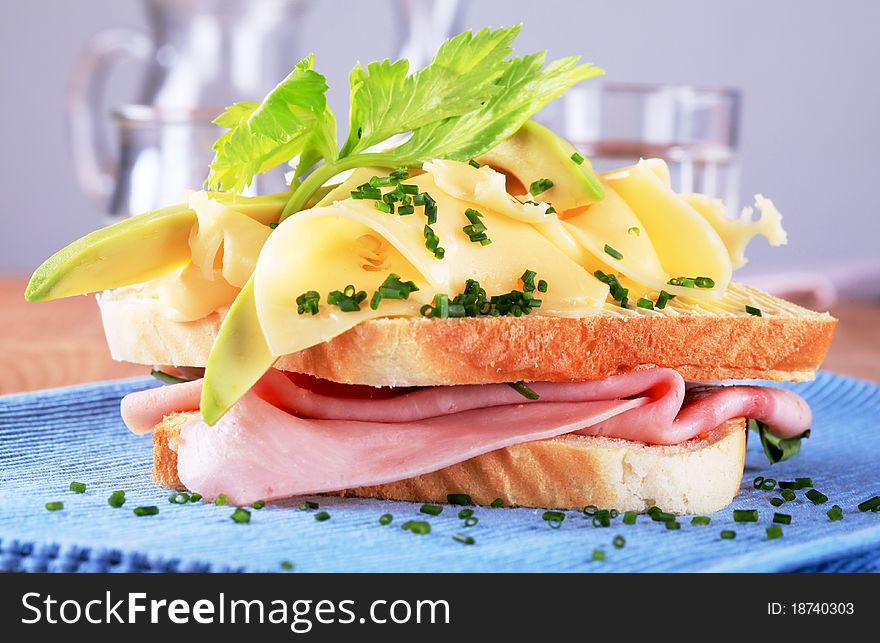 Ham and cheese sandwich sprinkled with chives