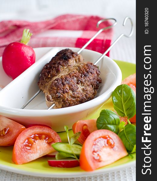 Minced meat kebab with fresh vegetable