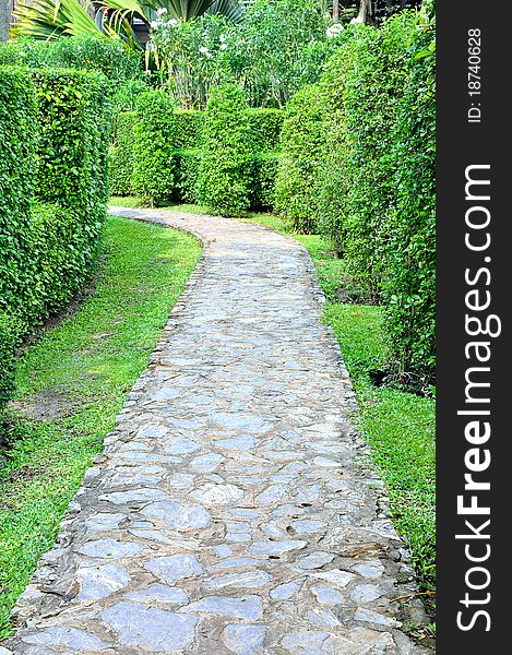 Stone walkway along the garden. Stone walkway along the garden