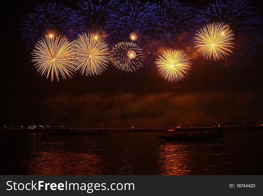 Colorful fireworks over a night sky -