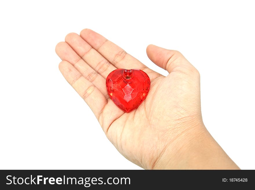 Heart in hands isolated on white background