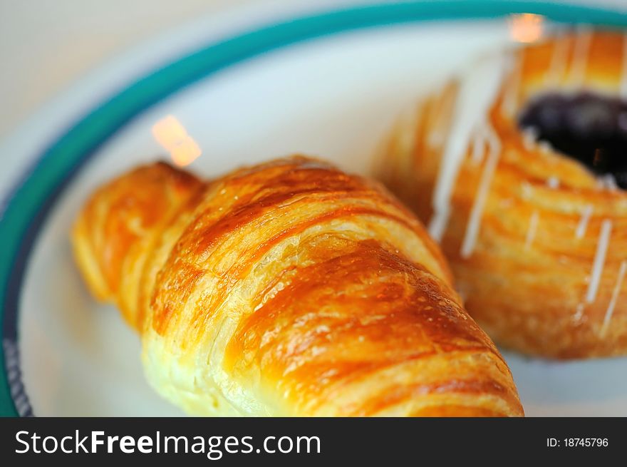 Freshly baked golden brown danish pastry. Freshly baked golden brown danish pastry.