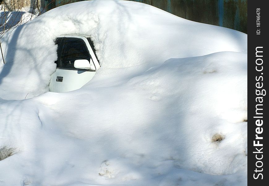 The Car Under The Snow.