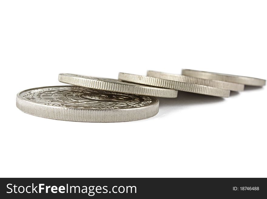Silver coins on a white background. Silver coins on a white background