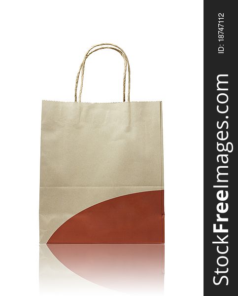 Brown paper bag on reflect floor and white background