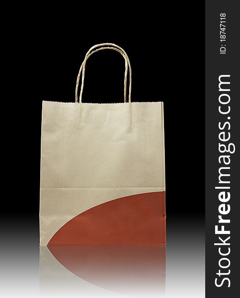 Brown paper bag on reflect floor and white background