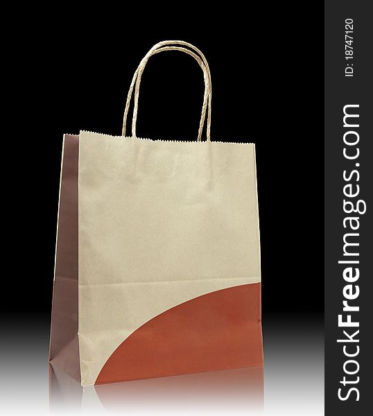 Brown paper bag on reflect floor and white background