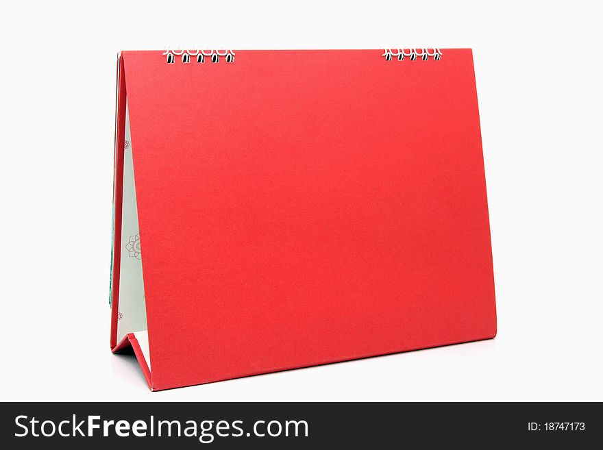 Red blank desktop calendar with isolated