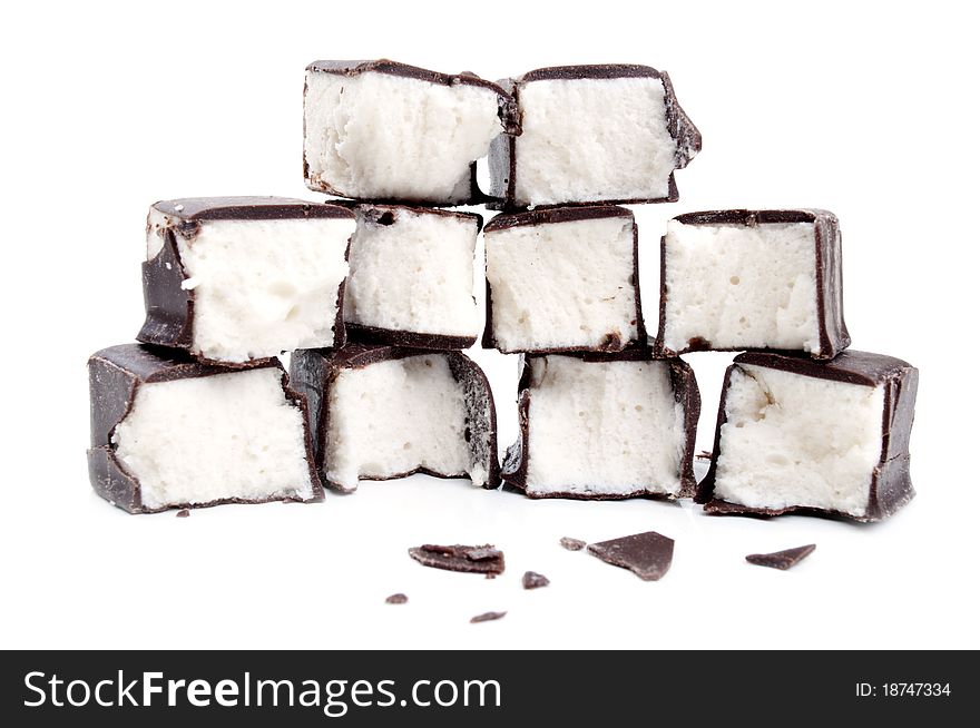 Delicious chocolate candy on a white background