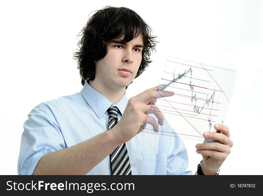 The businessman looks at the chart printed on a transparent material