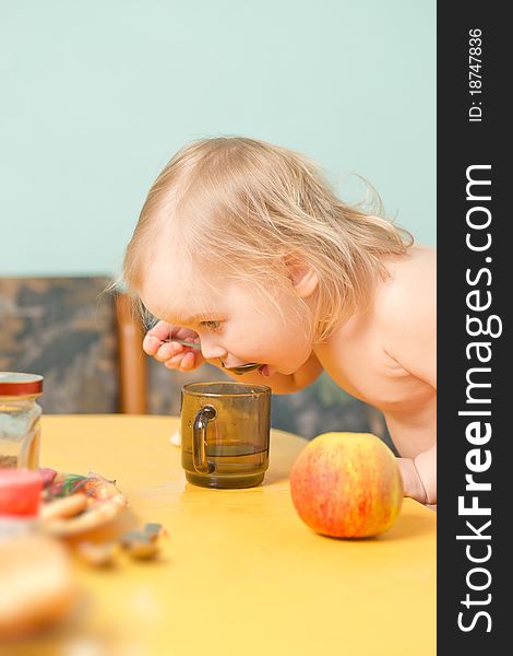 Adorable Baby Drink A Tea On Kitchen