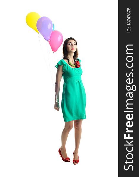 An image of young woman with birthday balloons. An image of young woman with birthday balloons