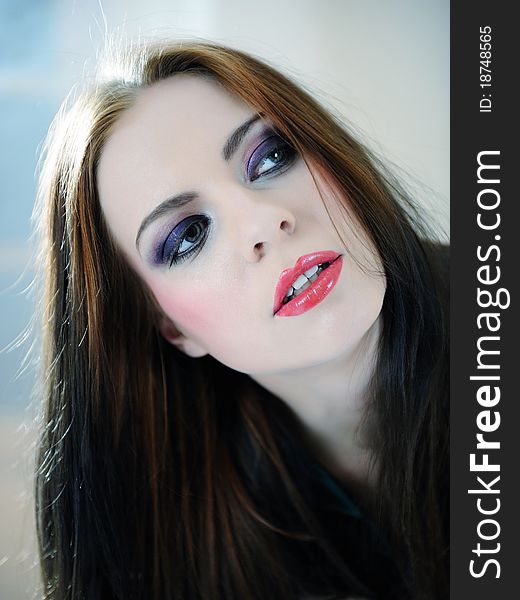 Beautiful model woman face with fashion make-up